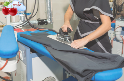 A worker in a professional laundry facility uses an industrial steam iron on dark trousers, demonstrating the high-quality garment care managed by Stock Pickup & Delivery Software. The Geelus logo is visible in the top left corner, highlighting the cloud-based system that tracks this production stage.